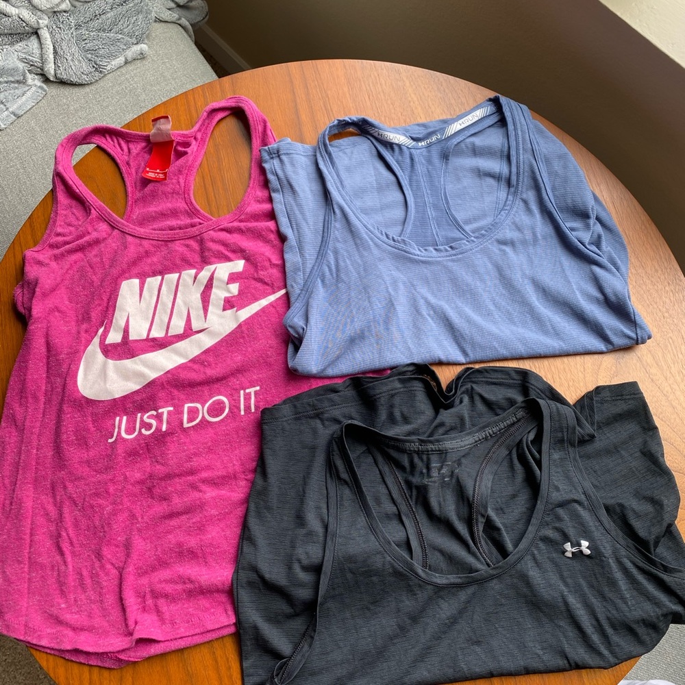 Nike and under armour tanks size M